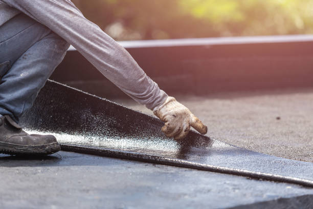 Professional Basement Waterproofing technician working in Clifford, IN